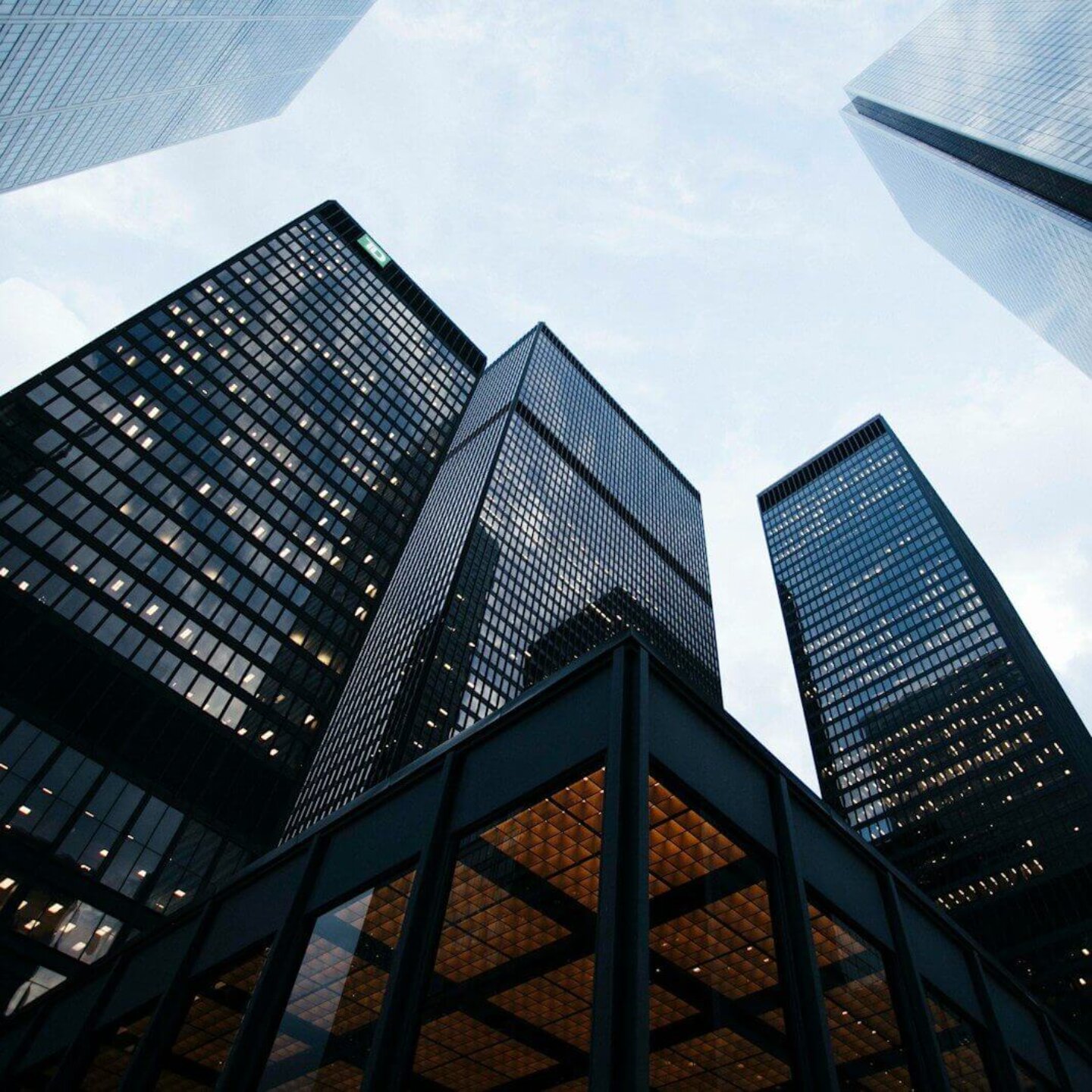 low angle photo of city high rise buildings during daytime